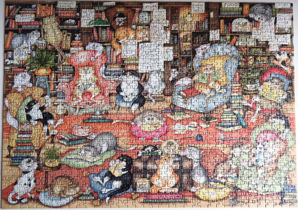 A whimsical illustration of a library filled with numerous cats reading books in cozy chairs.