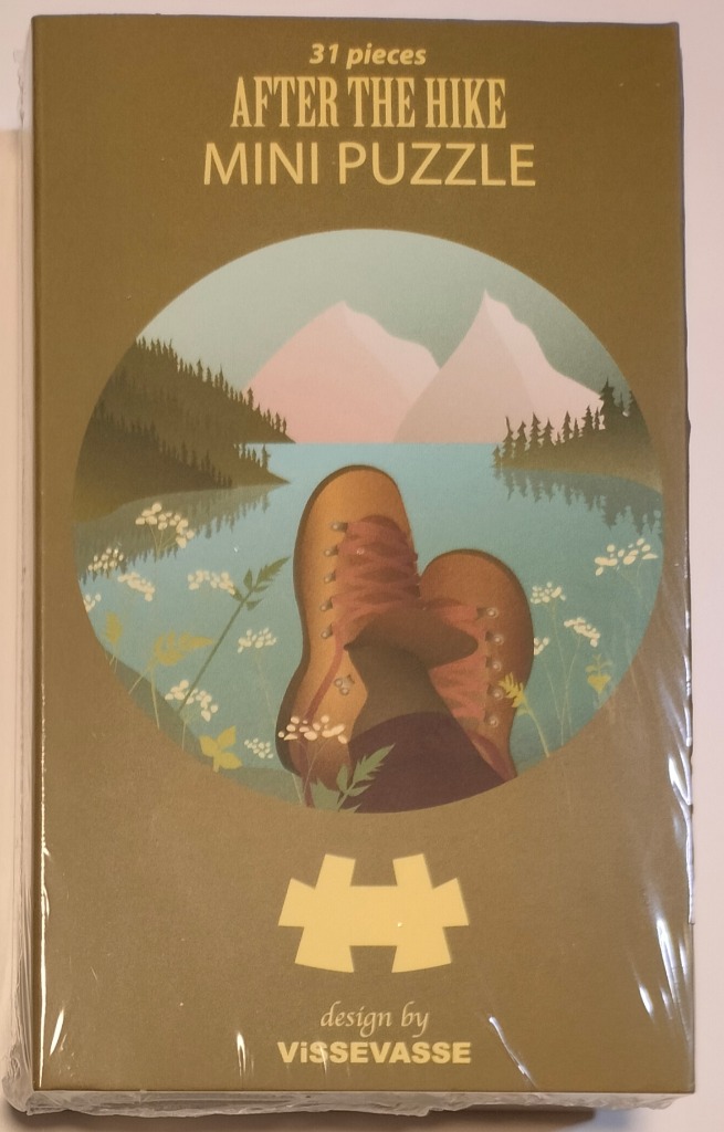 Illustration of hiking boots resting against a lake and mountain backdrop.