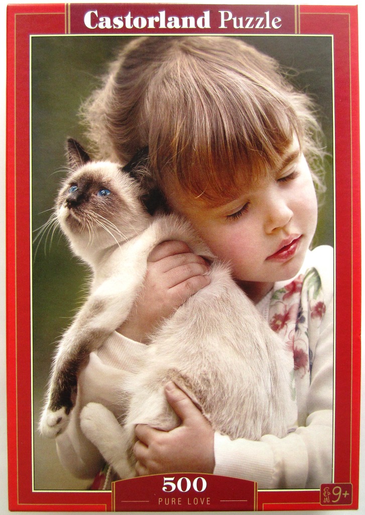 A young girl with light brown hair tenderly hugging a Siamese cat against a soft, dark green background.