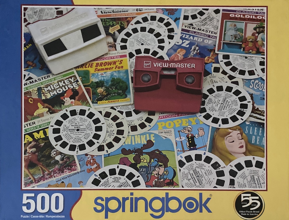 A nostalgic collage of vintage View-Master 3D slide viewers and circular picture reels featuring classic cartoon characters.