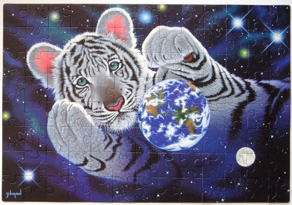 A white tiger cub playing with the planet Earth against a starry space background
