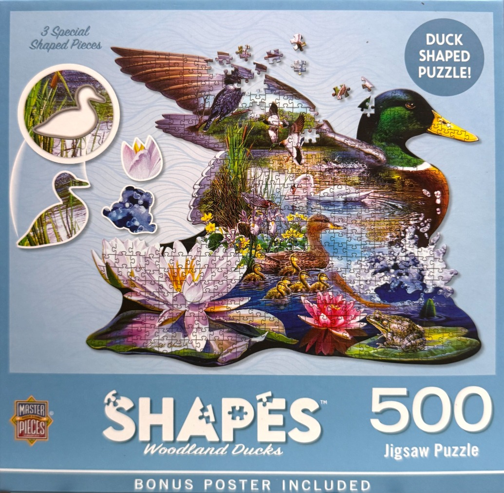 A shaped illustration of a mallard duck containing a detailed woodland pond scene with water lilies and ducklings.
