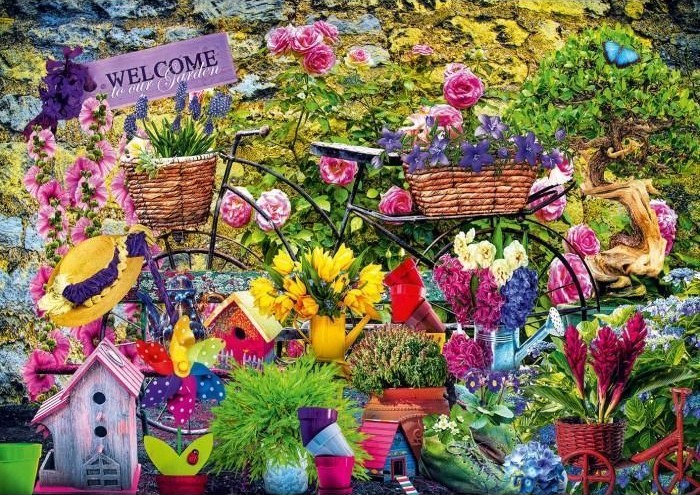 A whimsical garden scene featuring a vintage black bicycle overflowing with potted flowers and colorful birdhouses.