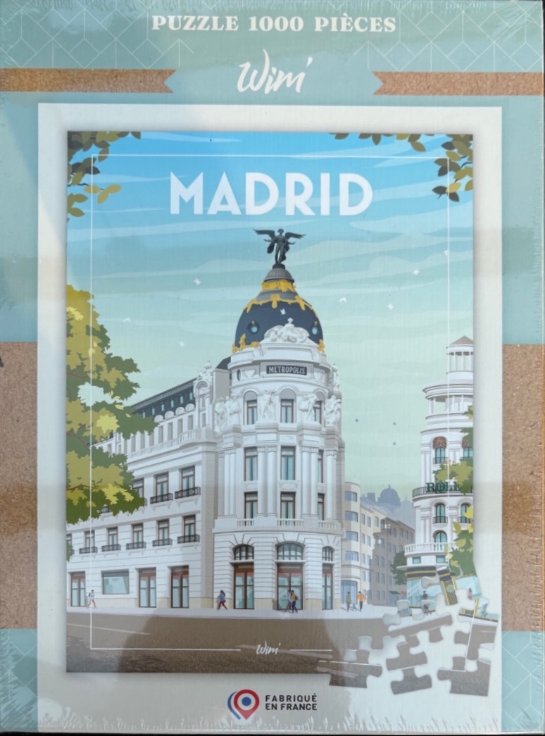 Illustration of the Metropolis building in Madrid under a pale blue sky.