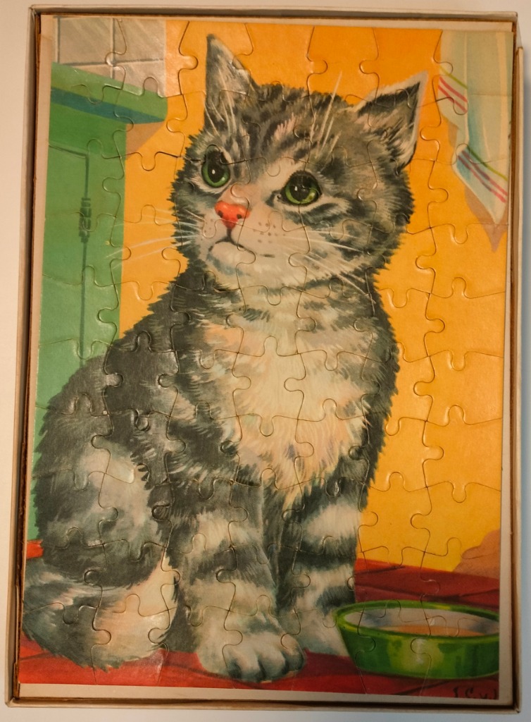 An illustration of a grey tabby kitten sitting on a red floor in a kitchen.