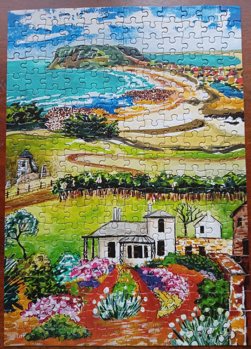 An impressionistic painting of a seaside cottage surrounded by vibrant gardens with a coastal headland in the background.