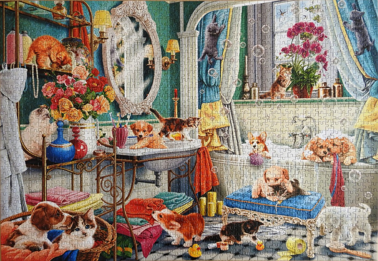 A busy, colourful bathroom filled with many playful puppies and kittens.