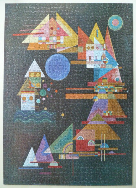 Abstract painting by Wassily Kandinsky featuring geometric shapes, triangles, and circles on a dark background.