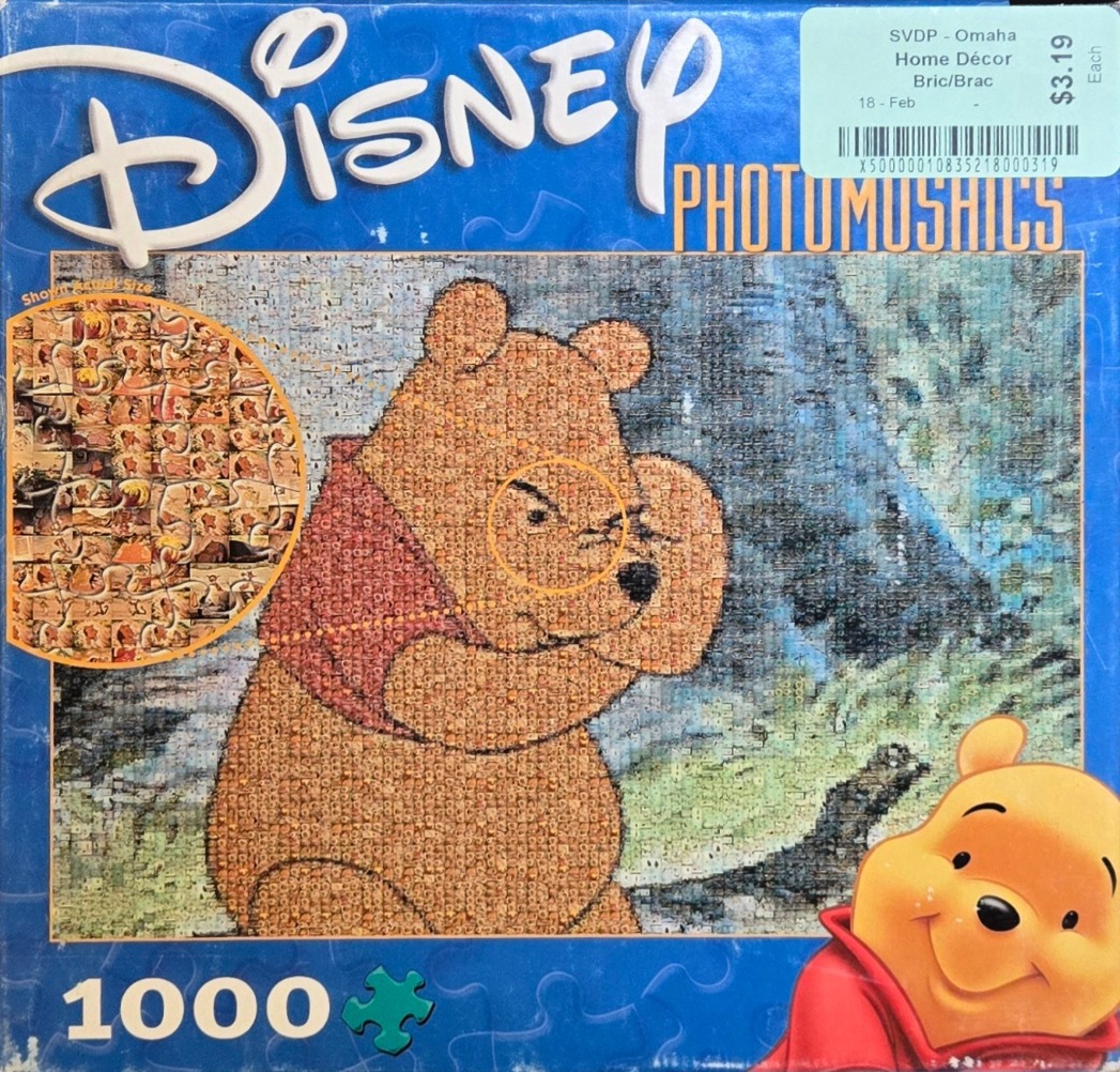 A photo-mosaic of Winnie the Pooh created from hundreds of small images of Disney characters.