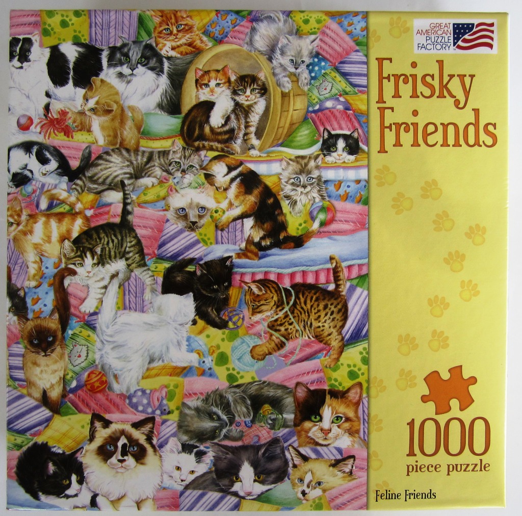 A whimsical illustration of many colorful kittens playing on a patchwork quilt.
