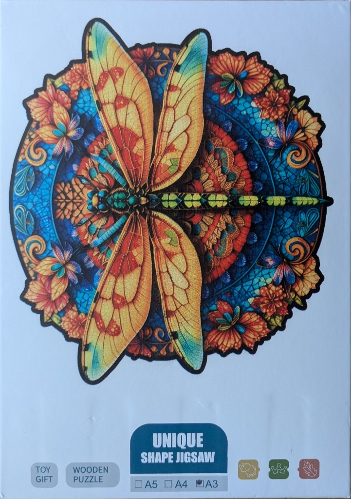 A vibrant, stylized dragonfly depicted in an intricate, circular stained-glass style pattern.