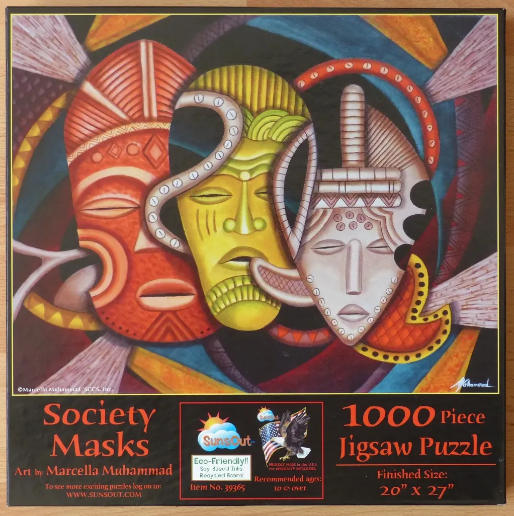 A painting of three stylized African-inspired masks in red, yellow, and white against a dark blue background.