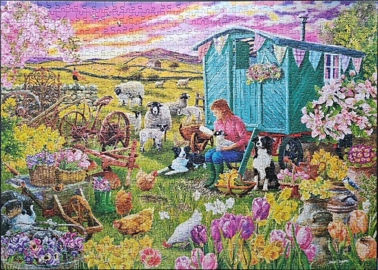 An illustration of a woman feeding a lamb outside a teal shepherd's hut, surrounded by dogs, sheep, and spring flowers.
