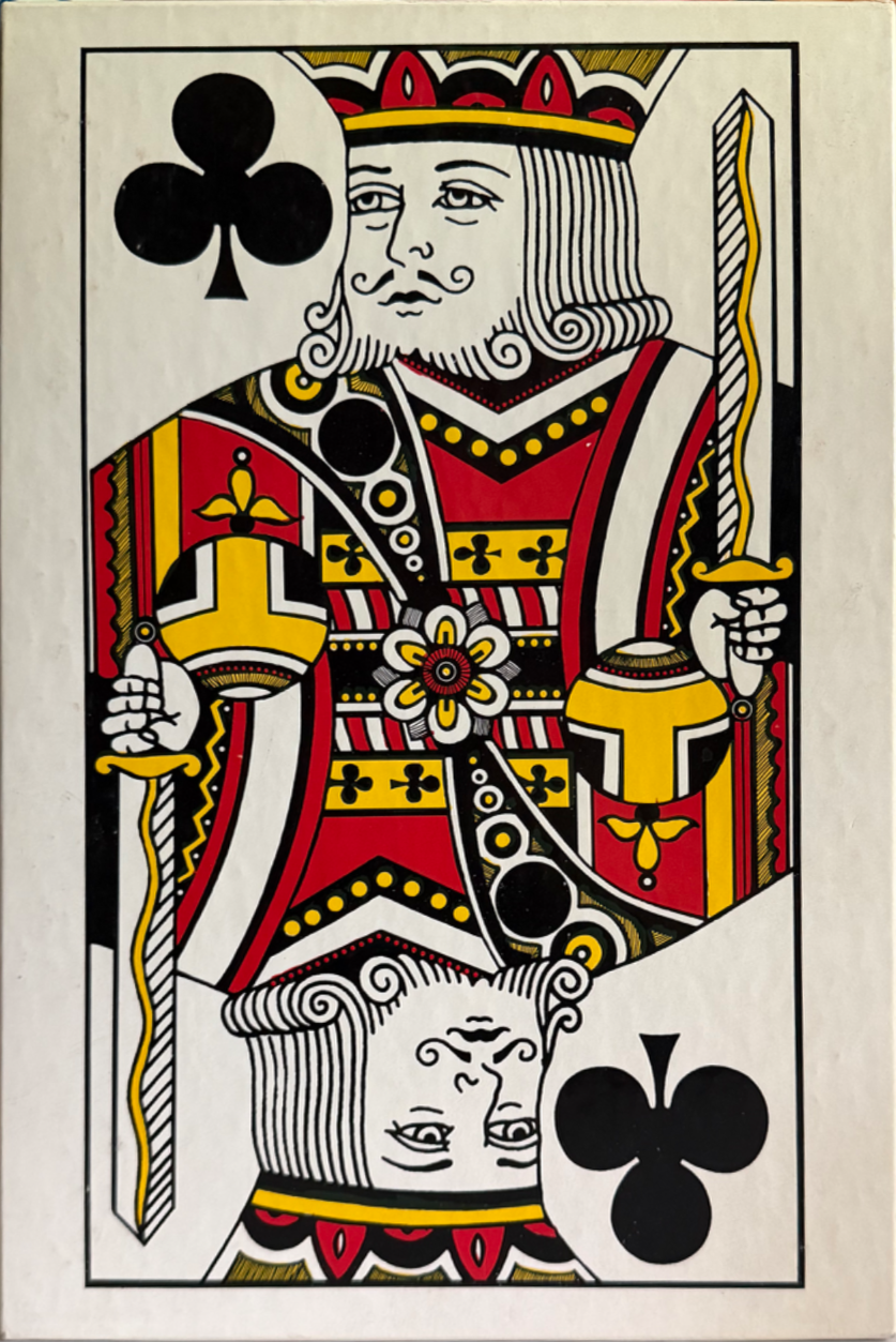 A classic King of Clubs playing card illustration featuring a mirror-image portrait with bold red, yellow, and black lines.