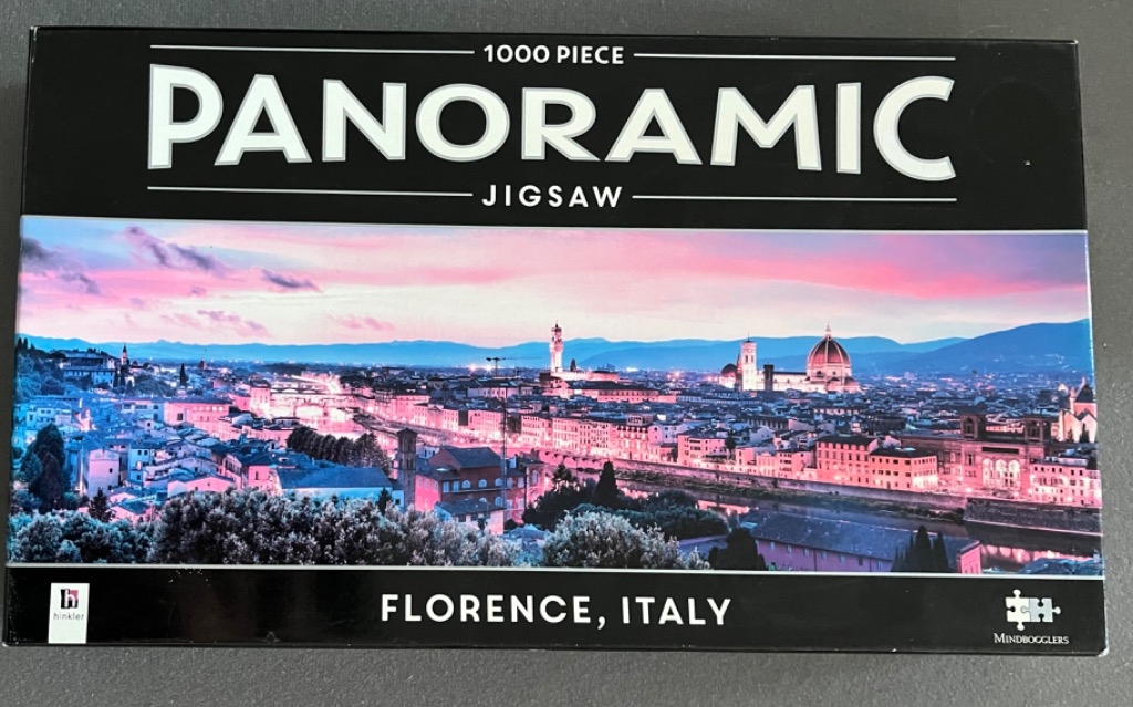 Panoramic sunset view over the historic Florence city skyline featuring the iconic cathedral dome.