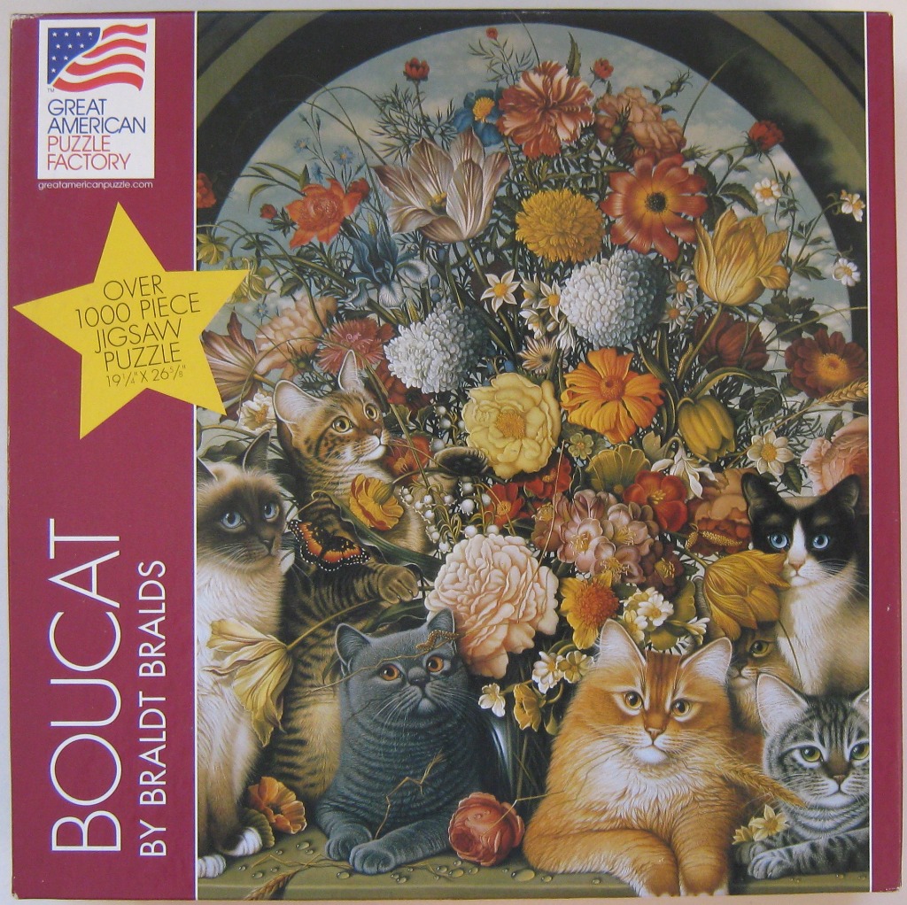 A lush floral arrangement in an arched alcove surrounded by several cats of different breeds and colors.