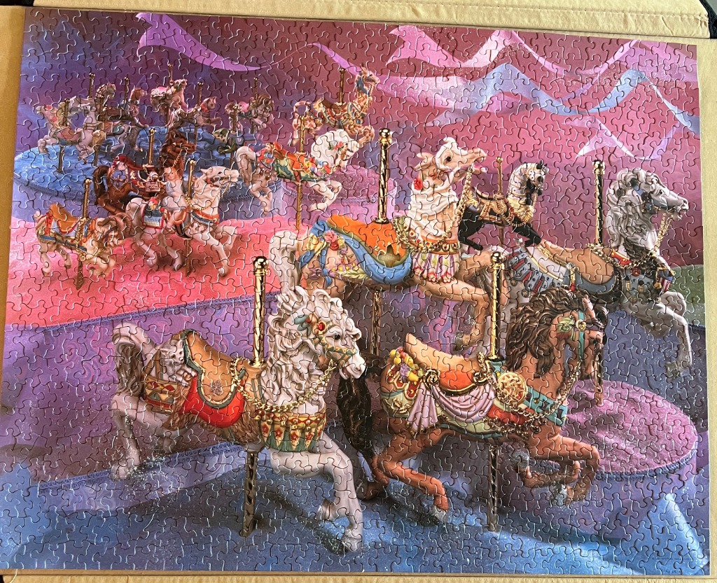 An illustration of multiple ornate carousel horses arranged in rows against a pink and purple backdrop.