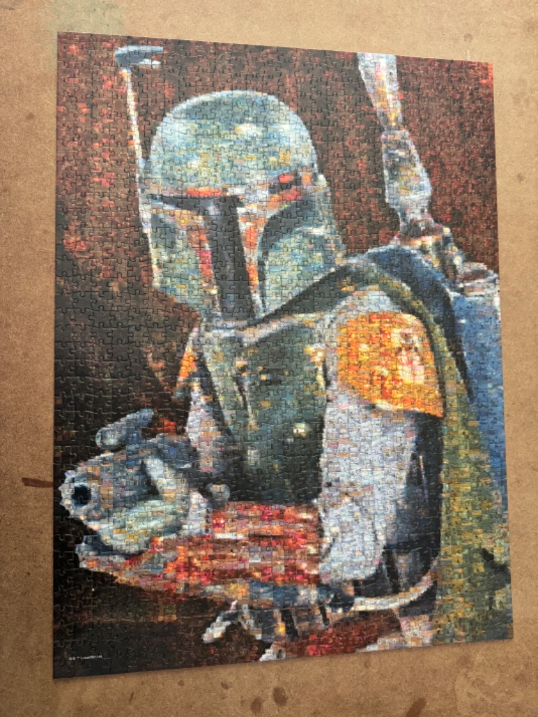 A mosaic-style artistic portrait of the bounty hunter Boba Fett featuring his iconic helmet and armor.