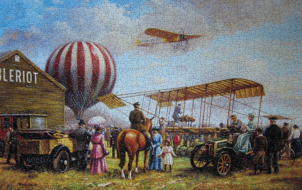 A nostalgic painting of early 20th-century aviation with a biplane, hot air balloon, vintage cars, and onlookers.
