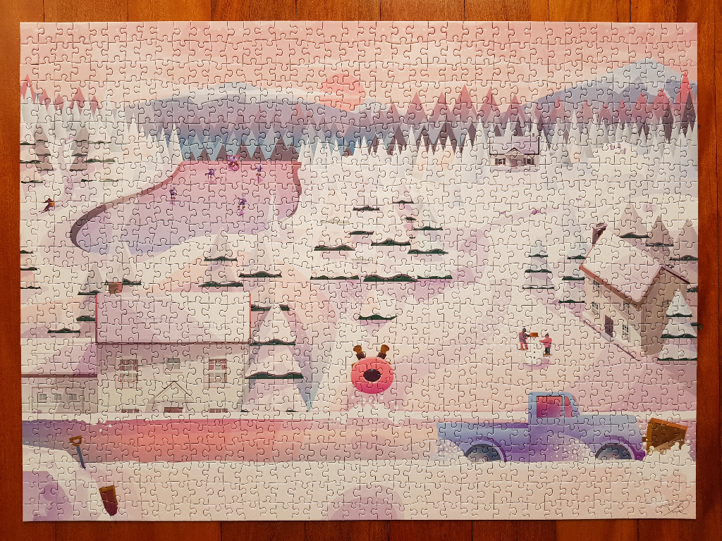 An illustrated winter landscape featuring a pink-hued snowy scene with houses, a frozen pond, and a blue truck.
