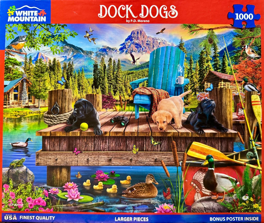 Three puppies on a wooden dock by a lake, surrounded by wildlife and mountain scenery.