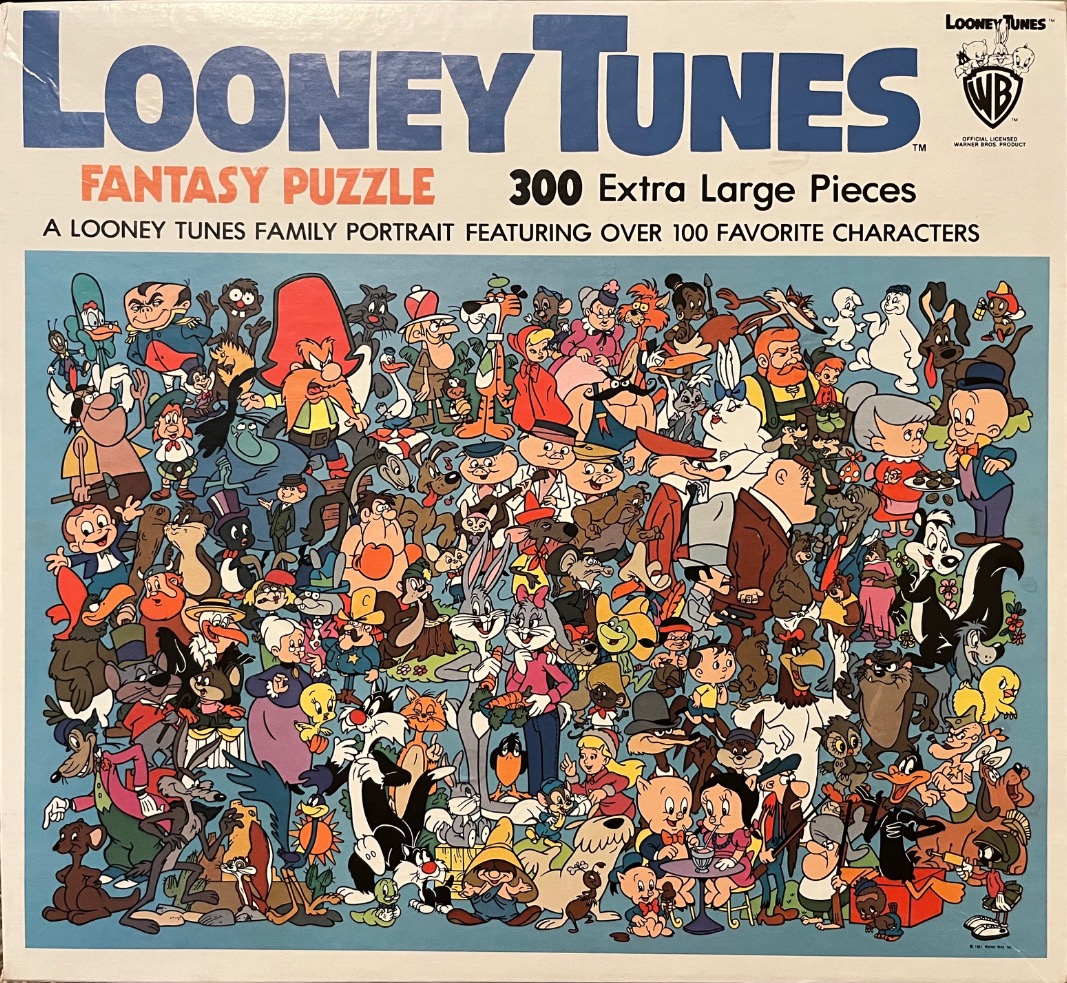 A dense, colorful illustration featuring a large cast of classic Looney Tunes characters in a group portrait.