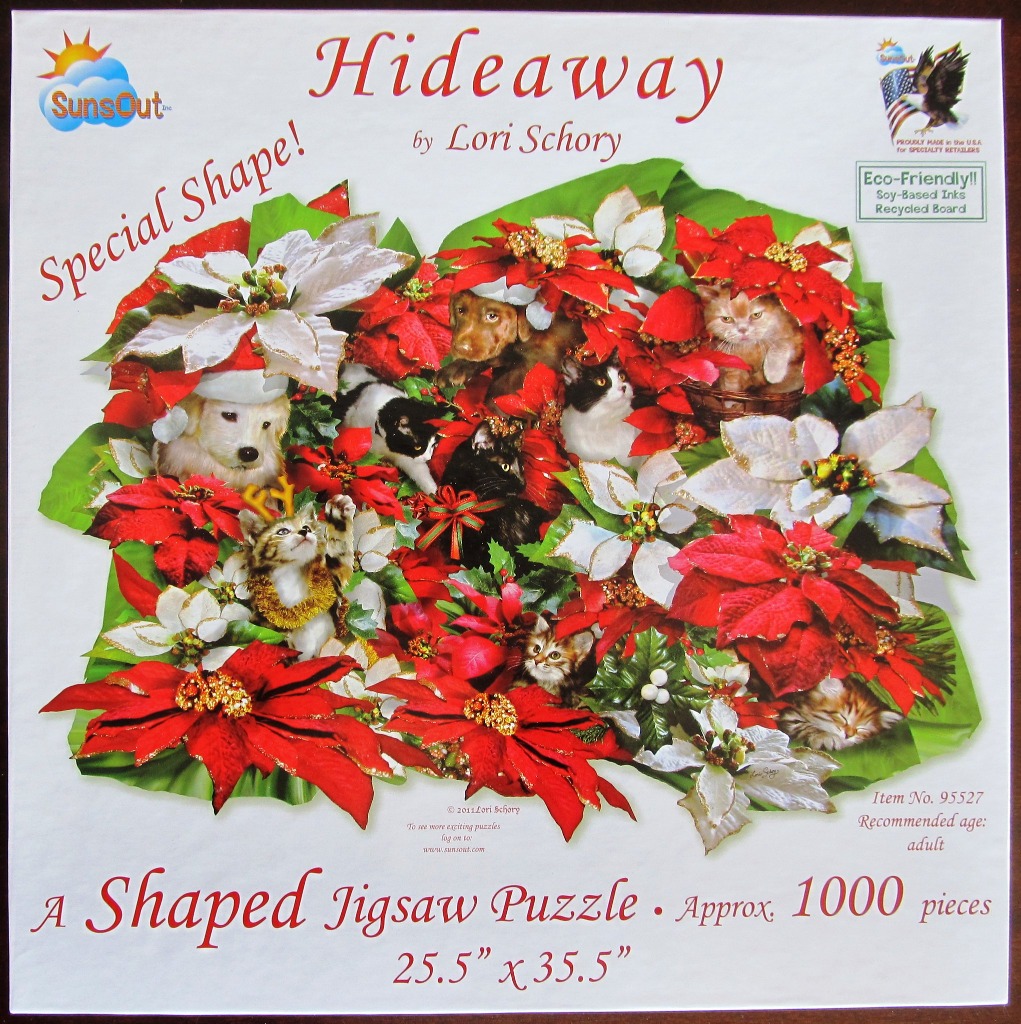A whimsical illustration of several puppies and kittens peeking through a dense arrangement of red and white poinsettias.