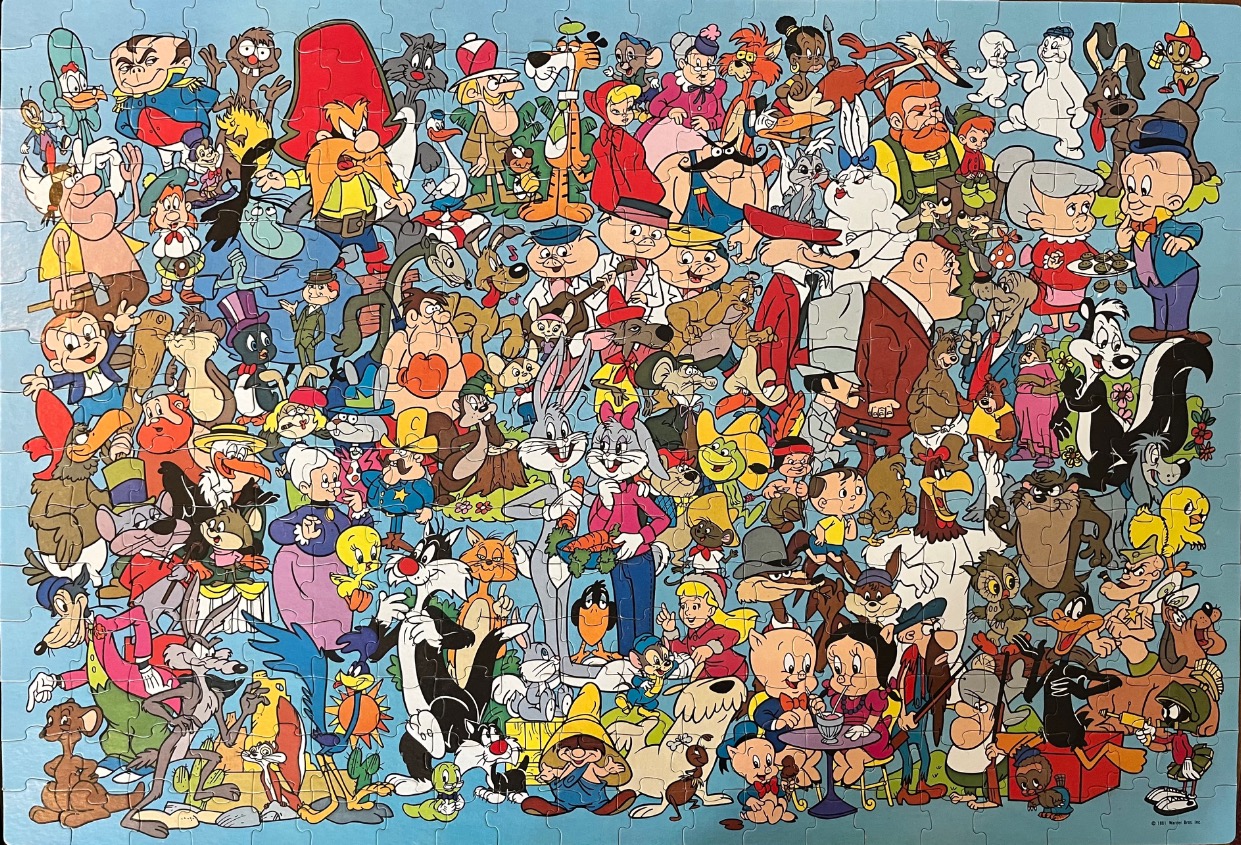 A dense illustration of dozens of classic cartoon characters arranged in a crowded group against a light blue background.