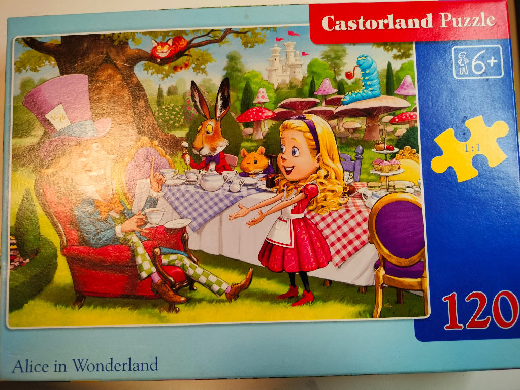 Illustration of Alice at the Mad Hatter's tea party in Wonderland with the March Hare, Dormouse, and Cheshire Cat.
