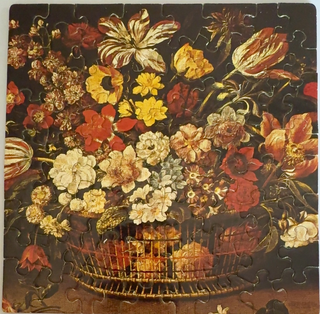 A floral still life painting of a basket overflowing with various yellow, white, and red flowers against a dark background.