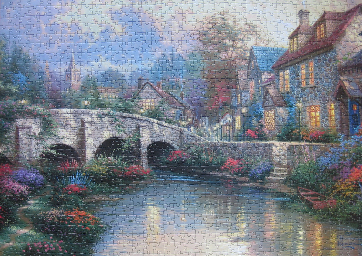 An idyllic stone village by a stream with a stone bridge and lush gardens in a warm, romantic artistic style.
