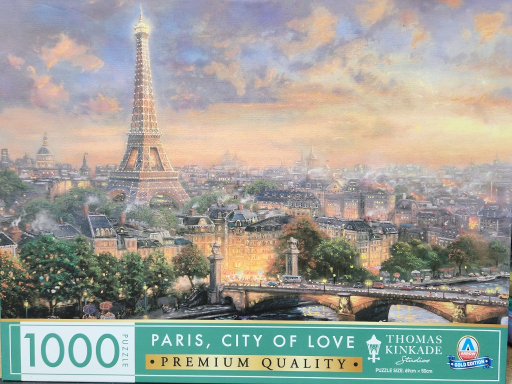 An impressionistic painting of the Eiffel Tower rising above the Parisian skyline at sunset.