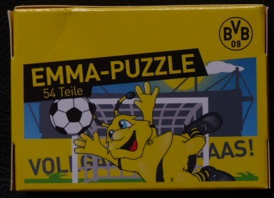 Cartoon bumblebee mascot diving to block a soccer ball in front of a stadium goal.