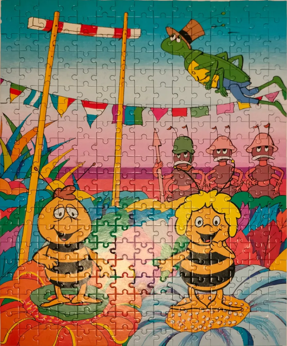 Cartoon illustration of Maya the Bee characters in a colorful meadow scene with a grasshopper and soldier ants.