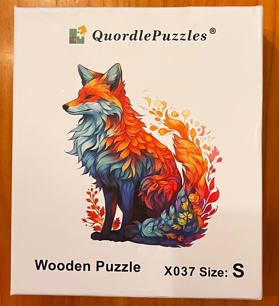 A vibrant digital illustration of a fox sitting, rendered with swirling autumnal colors and stylized, leaf-like fur.