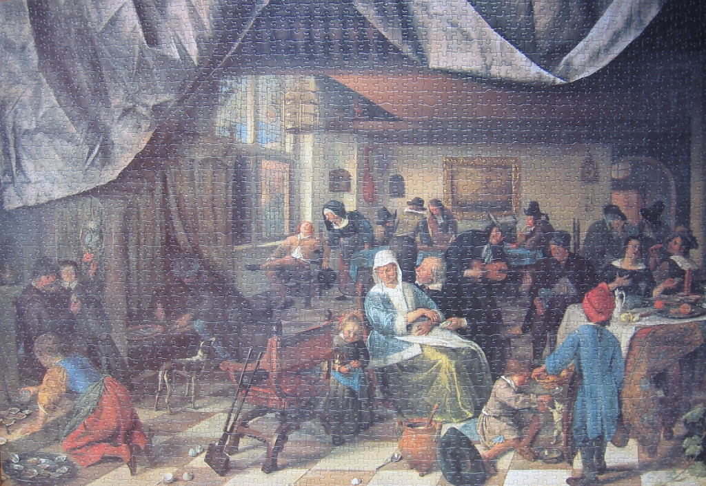 A 17th-century interior scene depicting a crowded tavern or household with many figures in traditional Dutch attire.