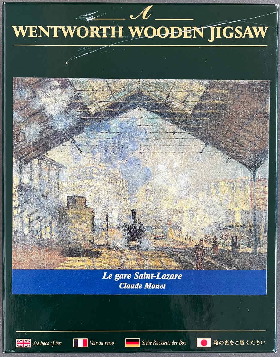 Claude Monet's impressionist painting of the Gare Saint-Lazare train station, featuring steam and architecture.