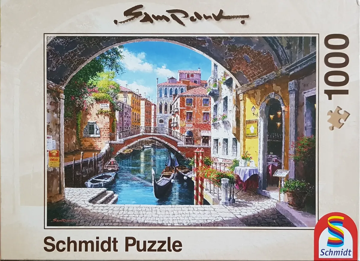 An oil painting of a Venetian canal scene framed by a stone archway.