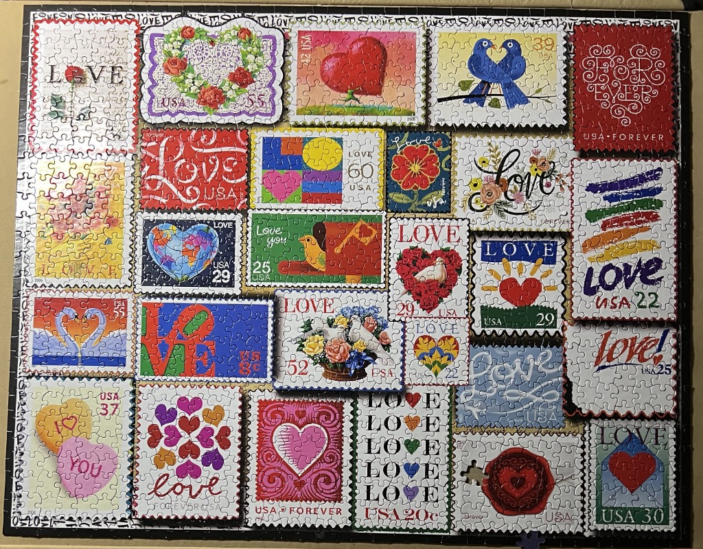 A collage of various vintage and modern US postage stamps, all featuring themes of love and romance.