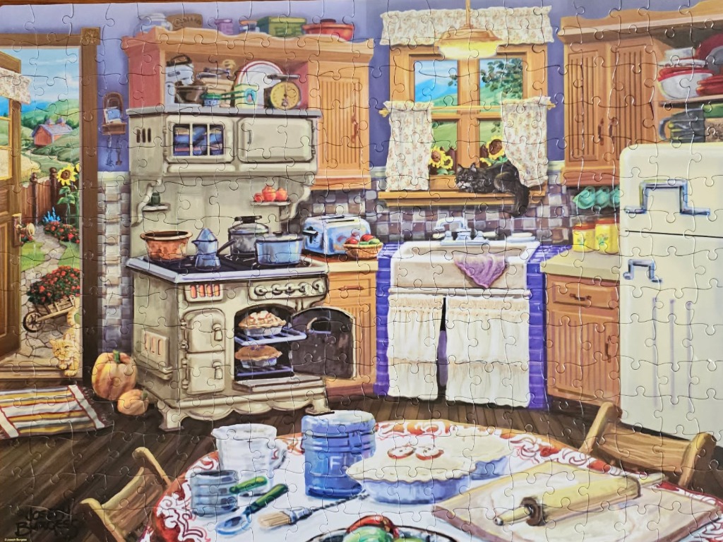 A cozy, vintage-style country kitchen illustration featuring a stove, farm views, and a cat in the window.