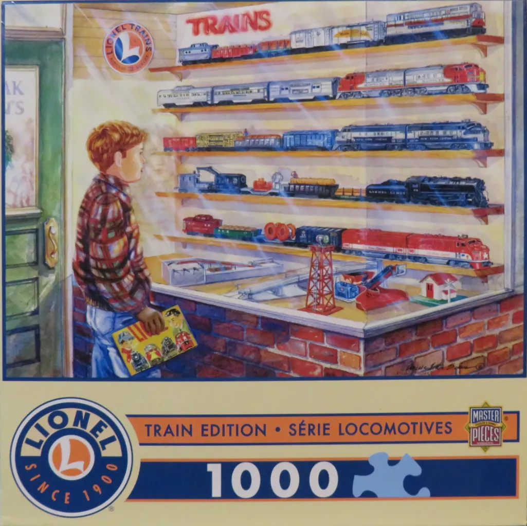 A young boy gazes at a toy store window filled with model trains.
