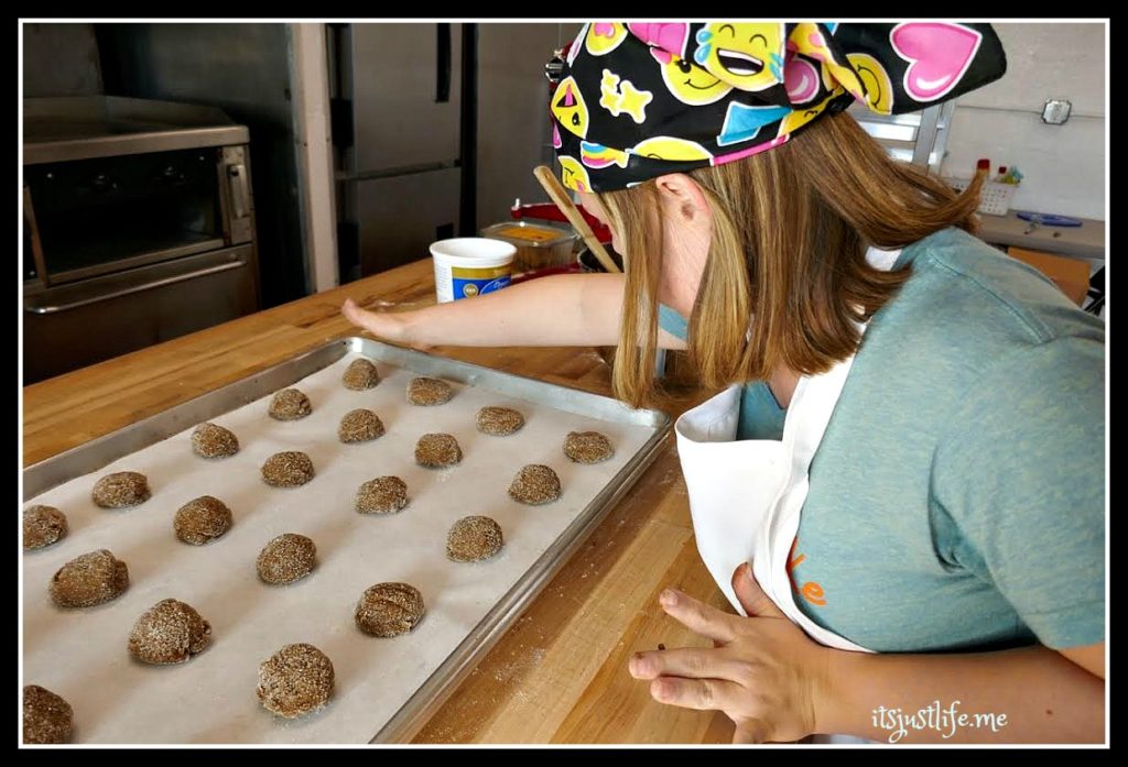 A final pat to make sure the cookies bake just right.