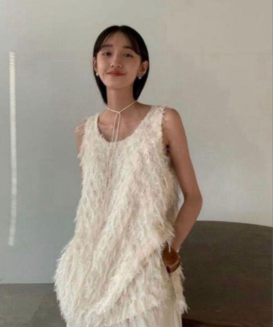 クラネ　W FACE CROSS FRINGE TOPS