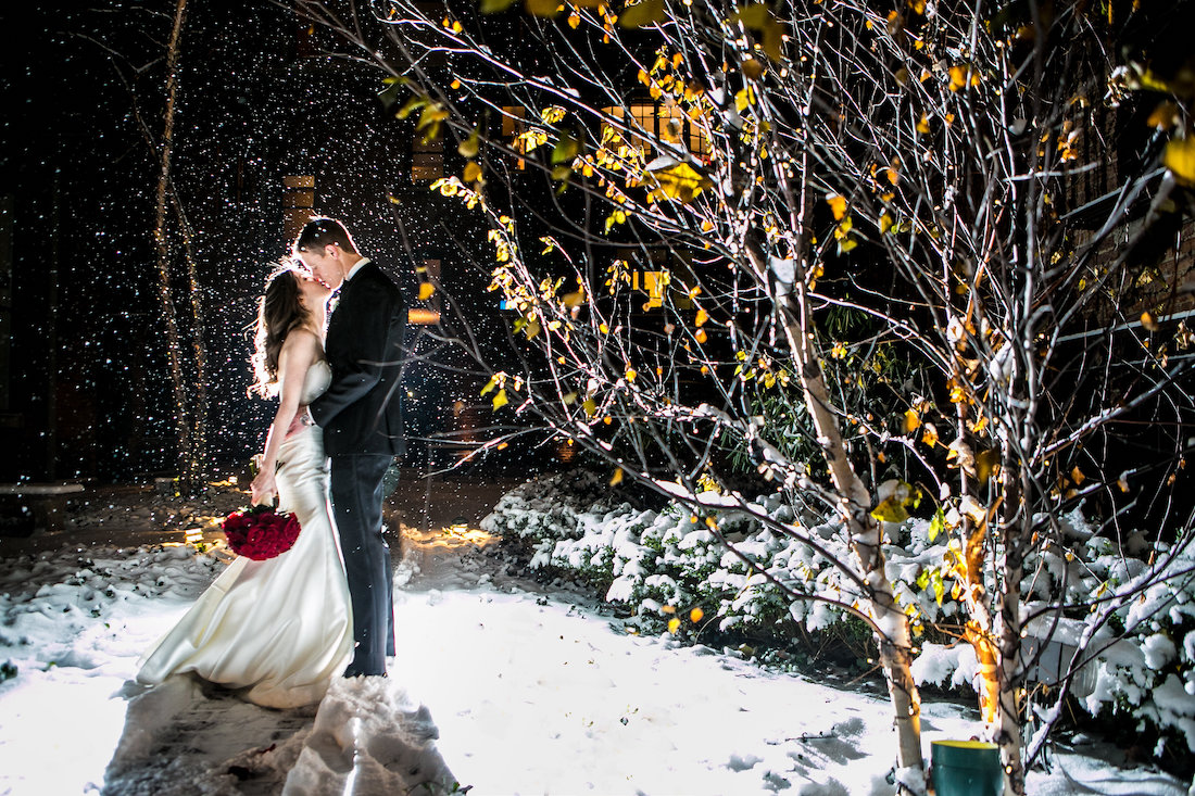 Couple in the snow in Courtyard