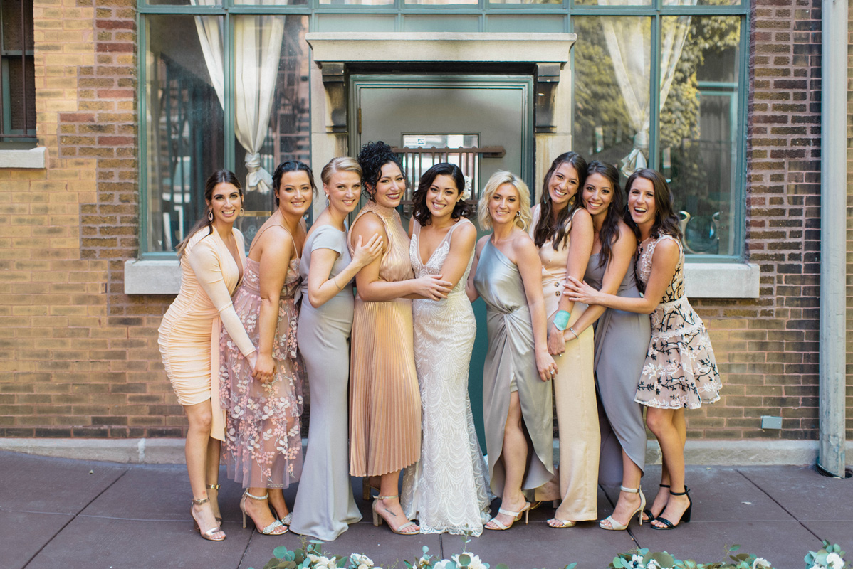 Bride & Bridesmaids in Courtyard