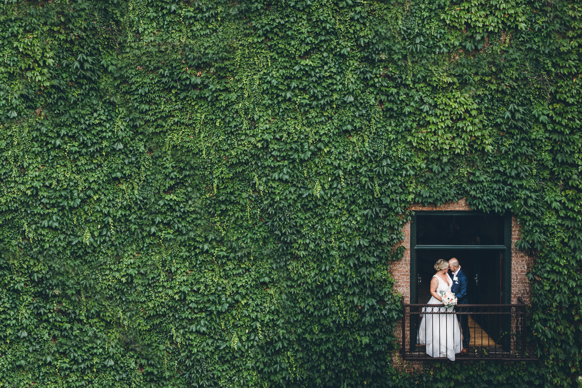 Ivy Shot with Couple in the Window