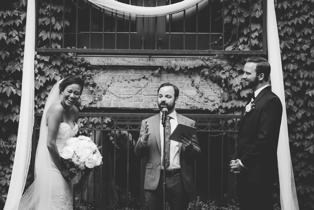 Couple laughing during ceremony