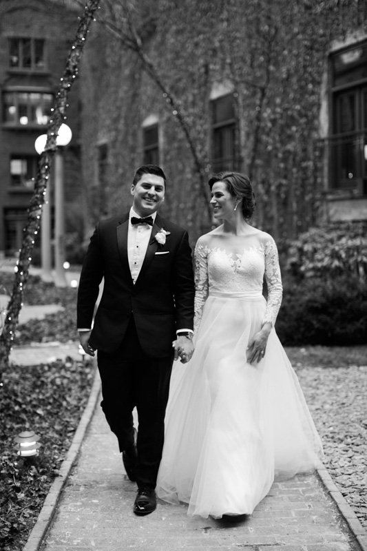 Couple walking in courtyard