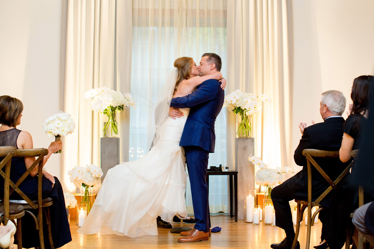 Couple Kissing at Ceremony