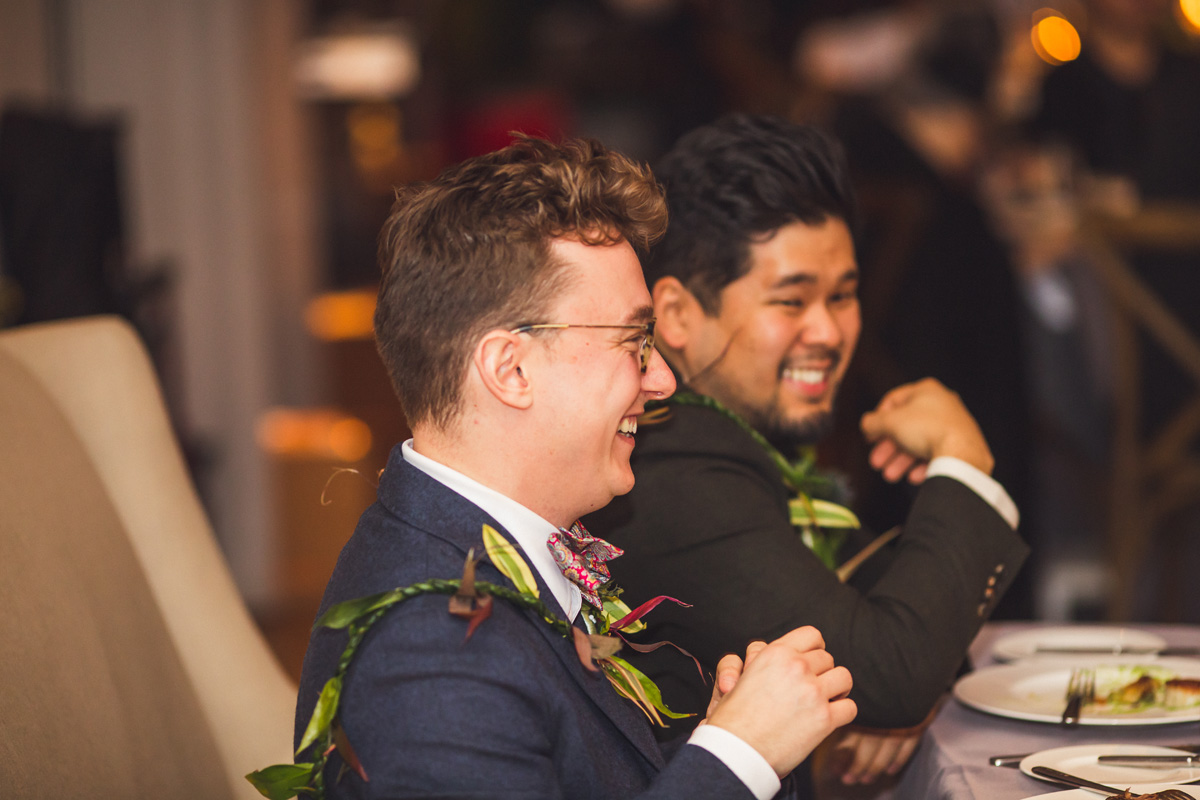 Couple laughing listening to speeches